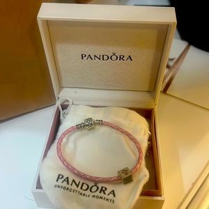 baby pandora bracelet in pink with a cross charm